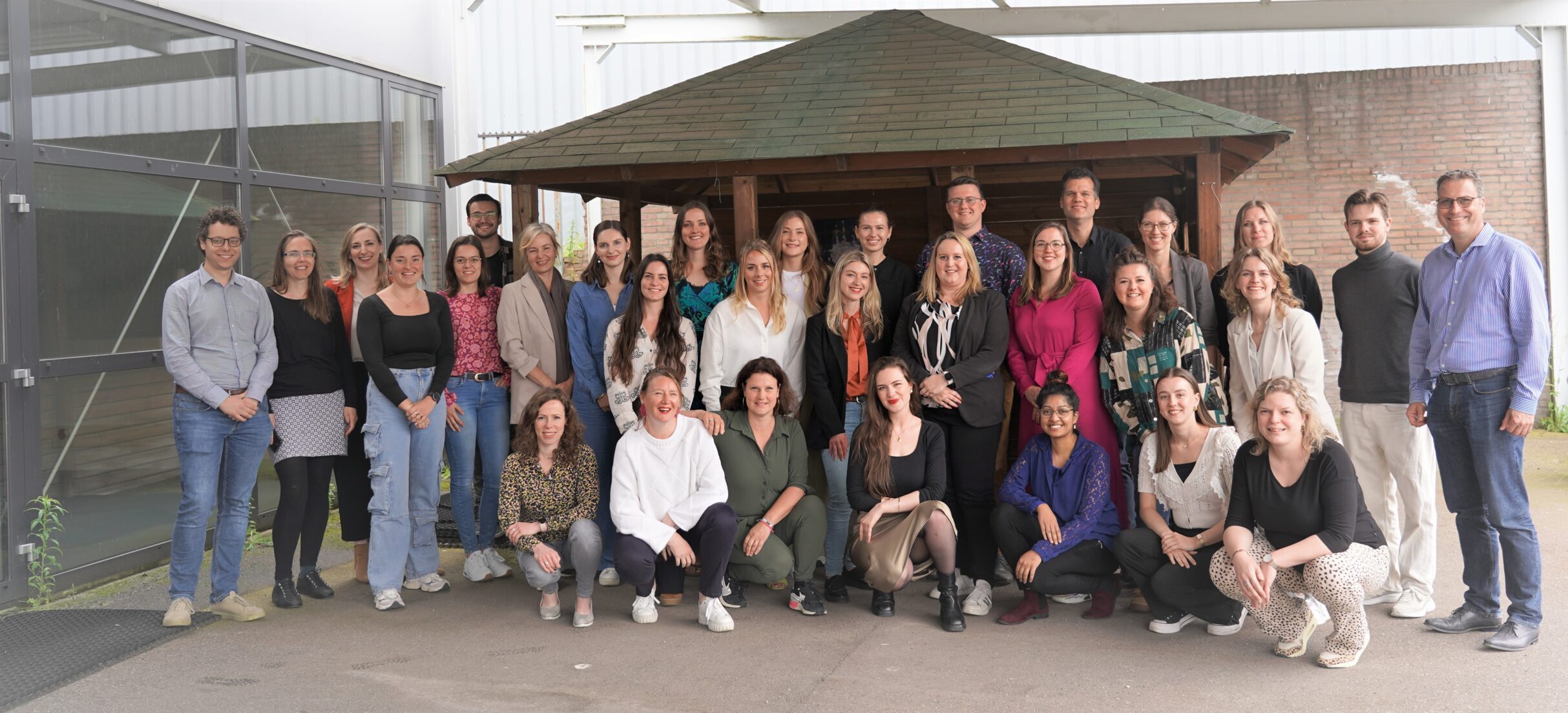 Een groepsfoto van alle onderzoekers van AWPG Mosa tijdens de researchdag 2024